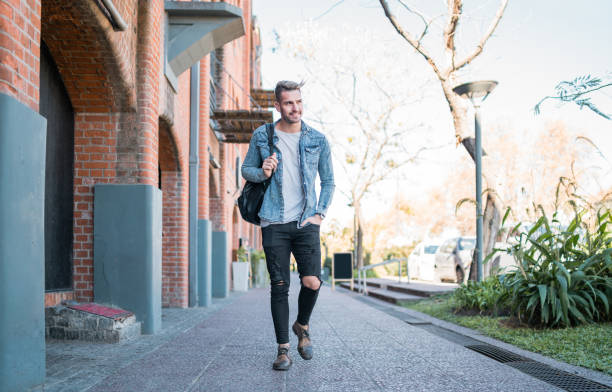 istock Man walking on the street. 1205080175