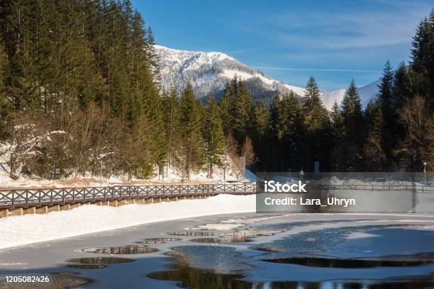Jasna Ski Resort In Low Tatras Slovakia Beautiful Winter Landscape With Artificial Lake Surrounded By Fir Tree Forest Stock Photo - Download Image Now