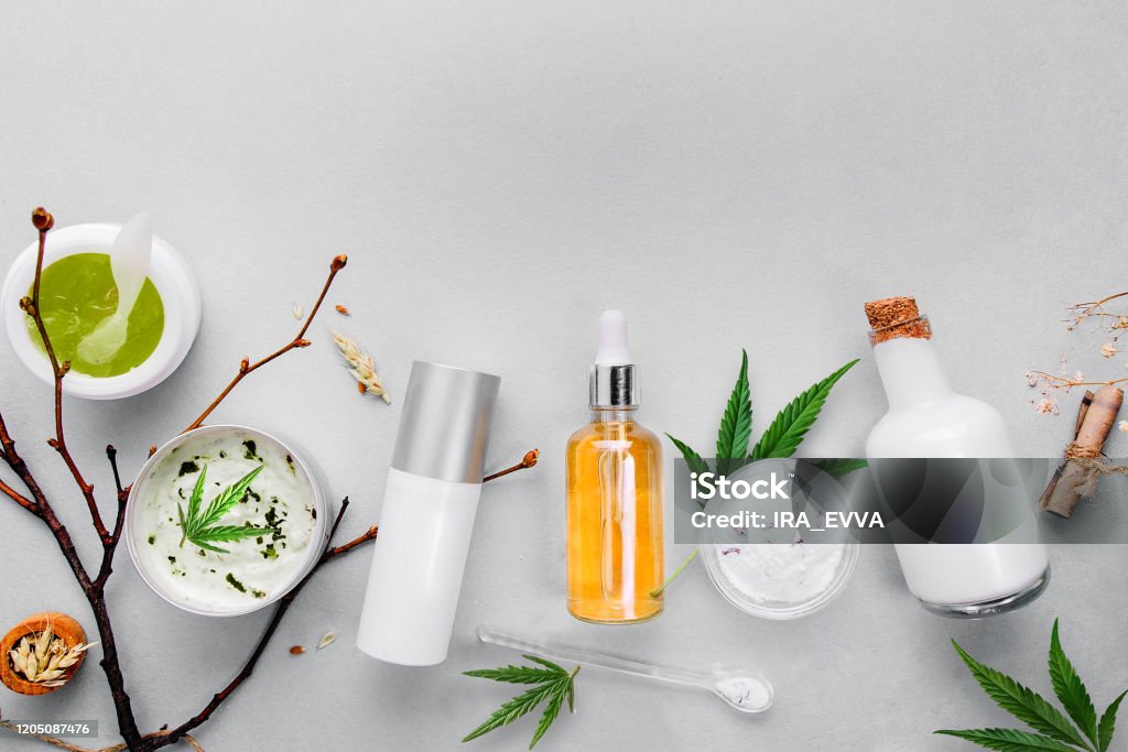 Cosmetics with cannabis CBD oil on light background. Concept natural skin care Cosmetics with cannabis CBD oil on light background. Concept skin care. Banner Make-Up Stock Photo