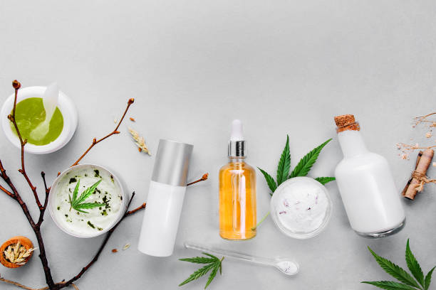 Cosmetics with cannabis CBD oil on light background. Concept natural skin care Cosmetics with cannabis CBD oil on light background. Concept skin care. Banner marijuana herbal cannabis stock pictures, royalty-free photos & images