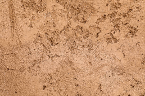 istock Rough crumbling texture of mud walls 1205088377