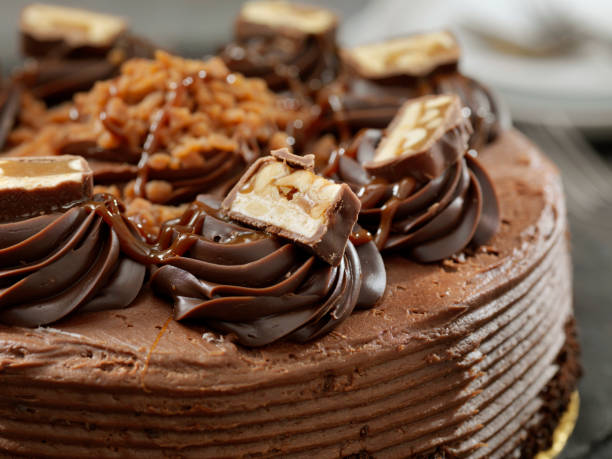 istock Caramel, Butter Toffee Crunch Chocolate Cake with Candy Bar Pieces 1205088396