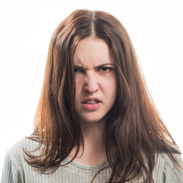 istock young angry brunet woman portrait 1205092106