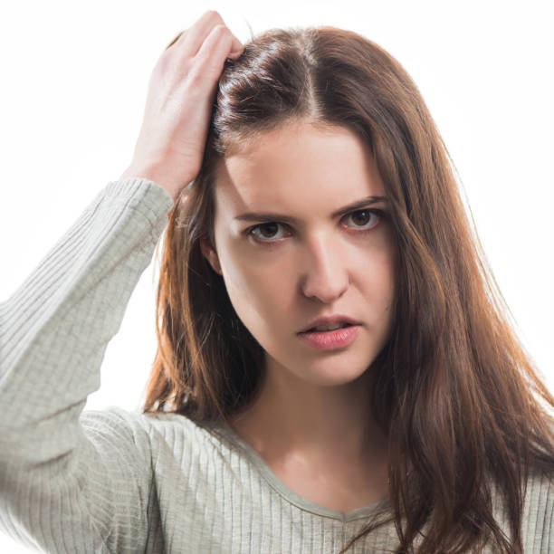 istock young angry brunet woman portrait 1205092212