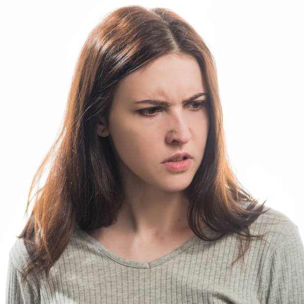 istock young angry brunet woman portrait 1205092345