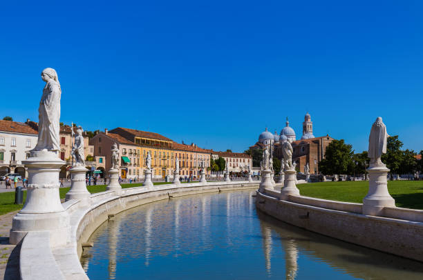 istock Canal with statues on prato della Valle in Padova Italy 1205094720