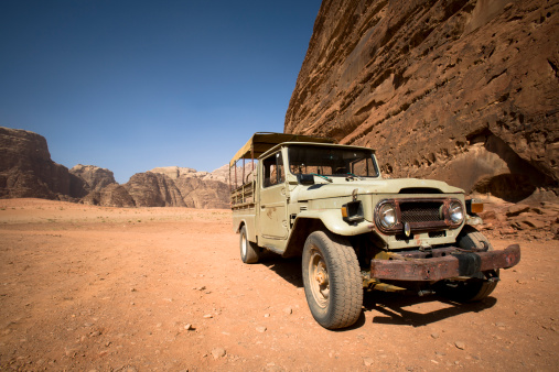 An old run down 4x4 vehicle in the desert