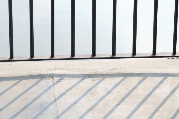 with a metal fence rails of a building