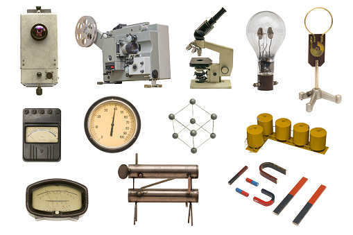 Various old fashioned laboratory equipment isolated on white background.