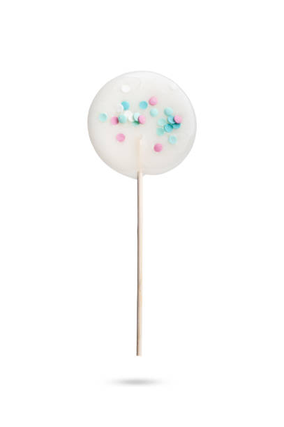 istock caramel cane on a wooden stick. isolated on white background 1205109940
