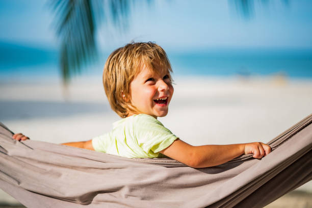istock Happy boy at the beach 1205109954