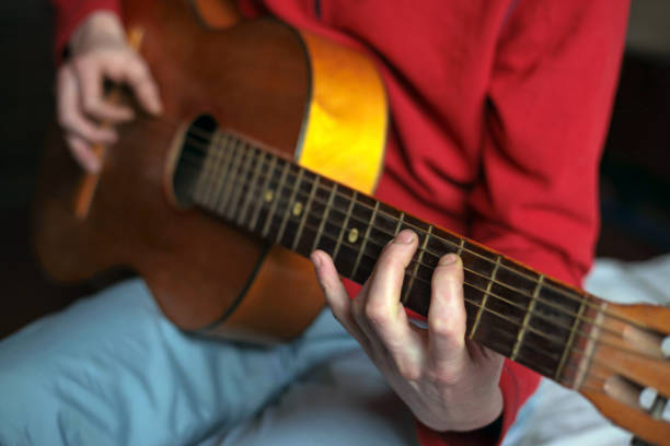 istock virtuoso guitarist playing his acoustic guitar 1205110647