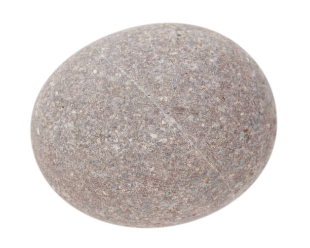 istock Grey round ball stone pebbles, isolated on white background 1205111318