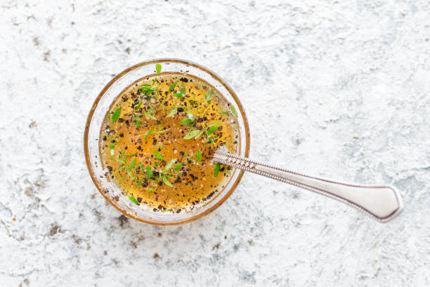 Peppered thyme honey sauce top view Peppered thyme honey sauce. Vegetarian healthy food concept. Top view. Copy space. salad dressing photos stock pictures, royalty-free photos & images