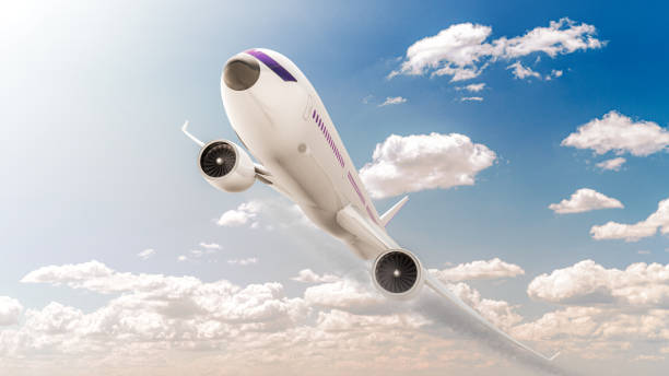 istock Airplane flying in blue sky with clouds. 1205112499