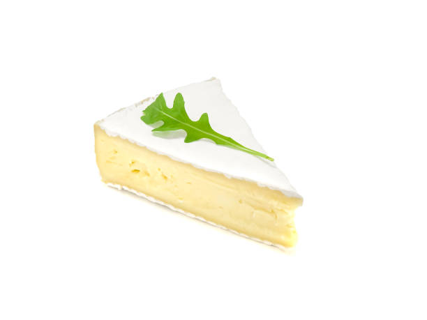 istock Brie type of cheese. Fresh Brie cheese and with green leavesrucola. 1205113902