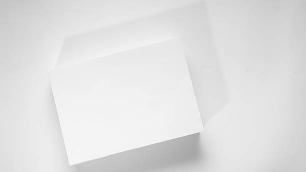 istock Stack of white office paper on light background, top view, place for text. 1205114571