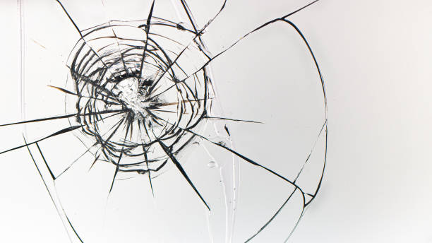 istock Holes from balls in glass on a white background 1205115926