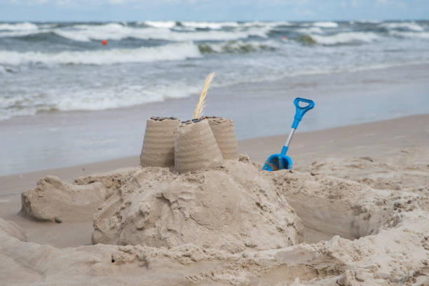 istock close up on sand castle on the beach 1205116181