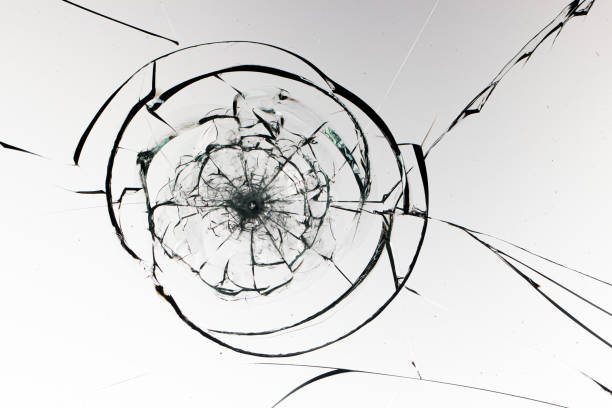 istock Holes from balls in glass on a white background 1205122900