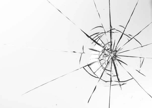 istock Holes from balls in glass on a white background 1205122902