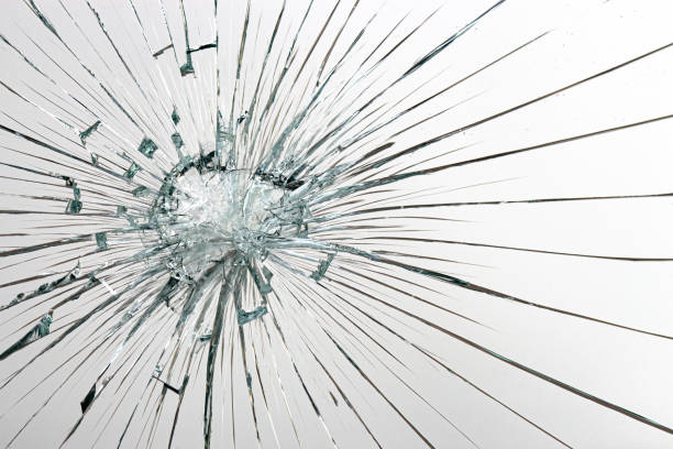 istock Holes from balls in glass on a white background 1205122912