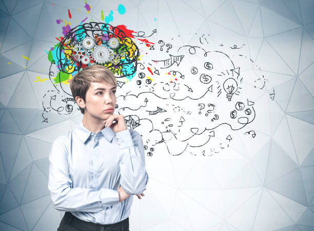 istock Beautiful young woman thinking about business 1205125465