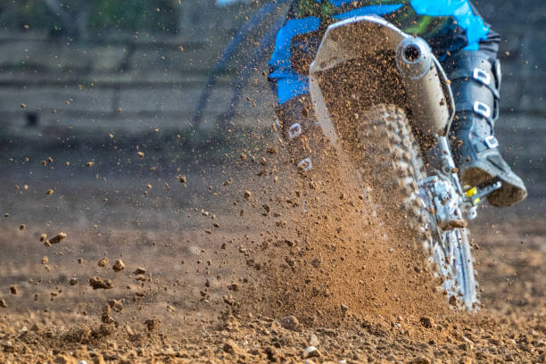 istock Motocross scene on a trail 1205125527