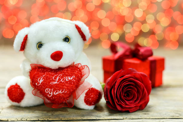 istock Teddy bear, gift and red rose. Valentines day 1205128482