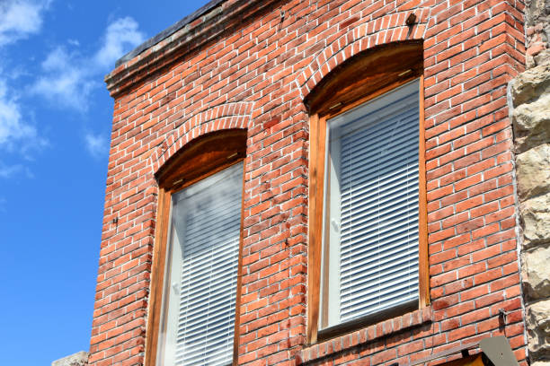 istock Two exterior wood framed windows 1205133186