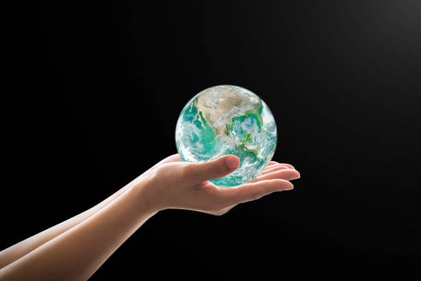 istock World environment concept with green earth on hand support: Elements of this image furnished by NASA 1205136771