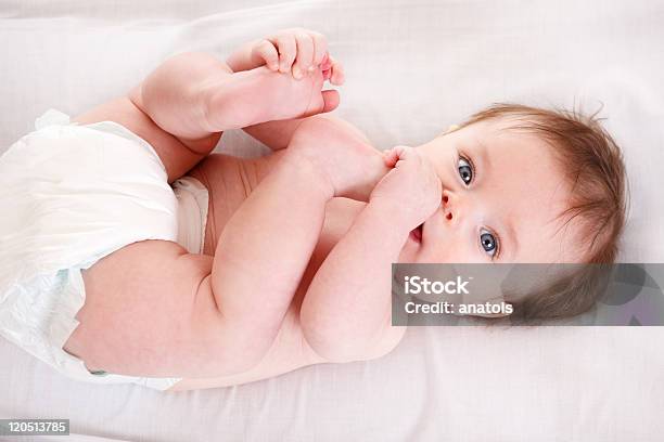 Cute Baby In Diaper Stock Photo - Download Image Now - Baby - Human Age, Beautiful People, Bed - Furniture