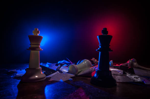istock Chess figures on a dark background with smoke and fog. Selective focus 1205138921