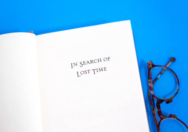 istock Open Book, Title Page: In Search of Lost Time, Blue Background 1205139997