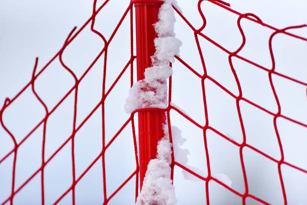 Snow and ice covered football court in the winter freezing day. River Danube environment, Futog Serbia