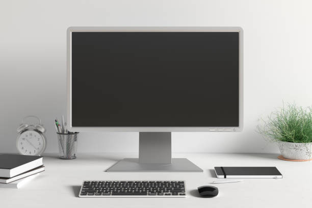 istock Workspace with blank computer monitor screen mock up. 1205143943