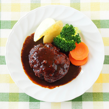 Demigrass hamburger on a white plate