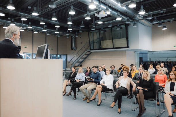 Business people sitting at seminar
