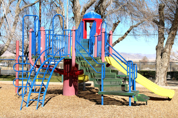 istock colorful kids playground climb slide 1205154795