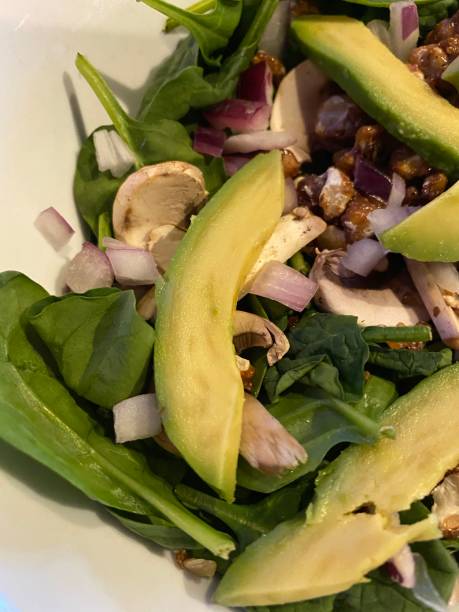 istock Spinach salad with avocados and walnuts 1205159387
