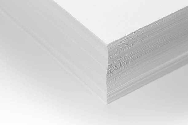 istock Stack of white office paper on light background, top view, place for text. 1205162087
