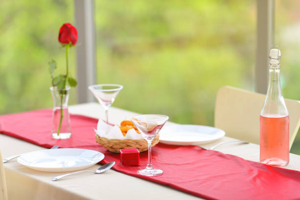 istock Luxury valentines dinner celebrating anniversary for couple which boyfriend preparing ring on the table for proposing his girlfriend with copy space 1205163460