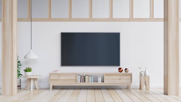 istock TV on cabinet in modern living room. 1205165536