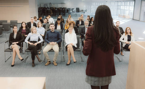 istock Business people sitting at seminar 1205168107