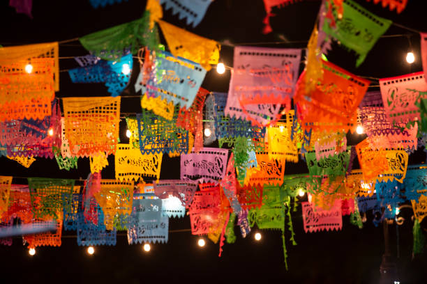 San Jose del Cabo Nighttime street scene of San José del Cabo’s historic city center. what is papel picado pictures stock pictures, royalty-free photos & images