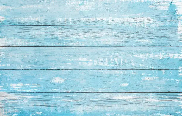 Photo of wooden plank blue sea color painted