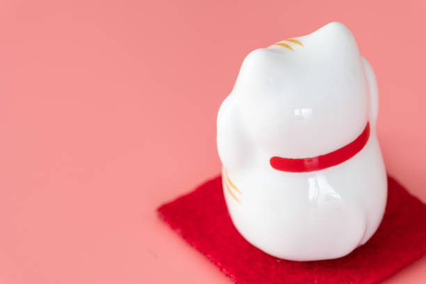 ceramics happy cat figure on pure color background view