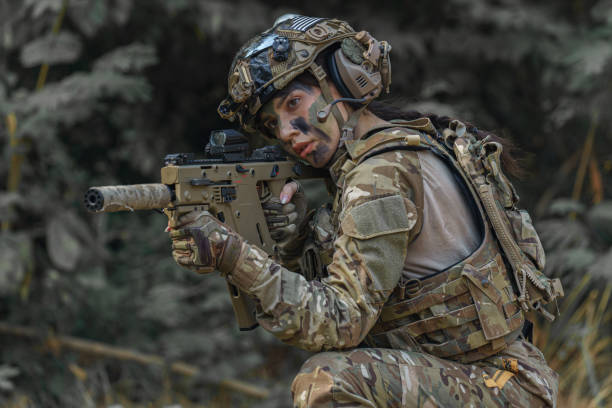Portrait of a woman soldier Portrait of a woman soldier army military concept female combat soldier stock pictures, royalty-free photos & images