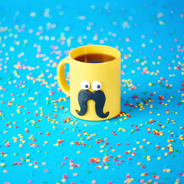istock Coffee cup character with eyes and mustache on blue background 1205174429