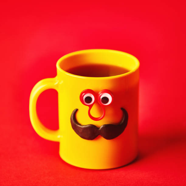 istock Coffee cup character with eyes and mustache on red background 1205174551